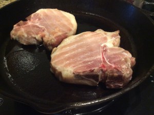 Chops removed from oven to brown in the skillet