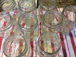 Lemon Juice into pints for canning