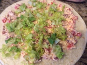 Spread a 3-4 tablespoons of the cream cheese mixture evenly over the tortillas and top with the lettuce....