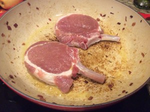 Chops go into the pan...remember do not move them so they will get that perfect sear!