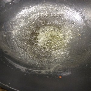 Butter melting in the wok