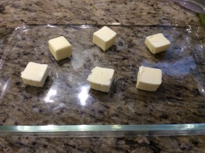 Butter going into oven to melt and heat pan....Important Step!
