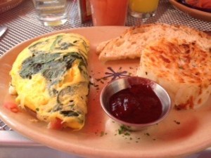 My spinach, swiss, and tomato omelet..perfectly cooked